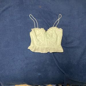 Turquoise spaghetti strap tank top with crossover in front size large